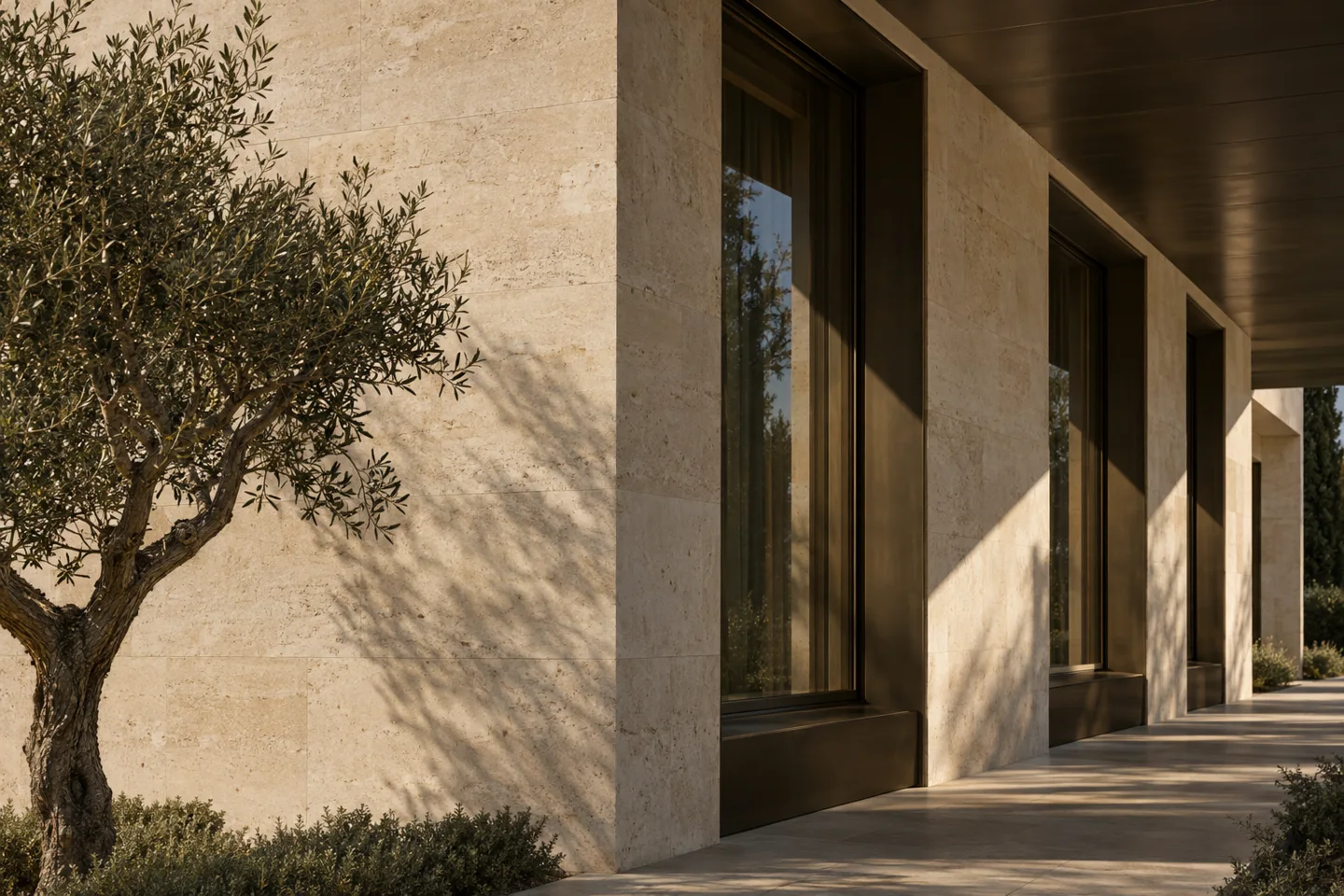 Sunlight falling across stone walls and bronze-framed windows, an architectural concept image